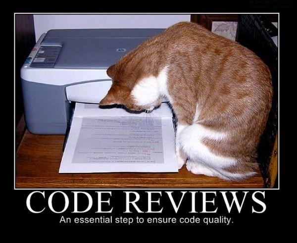 A cat reading code reviews rolling from a printer